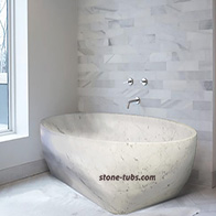 freestanding stone bath