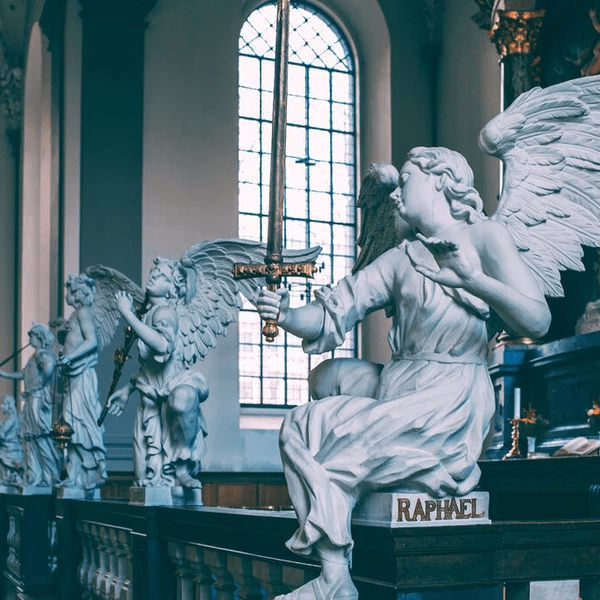 marble statue of angels in church